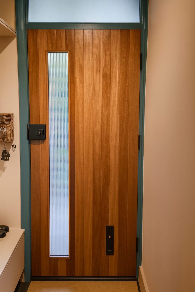 Modern Light brown wood door with glass panel, inside view